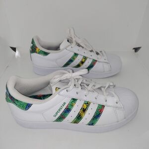 Adidas White and Green Athletic Shoes with Iconic Shell Toe
